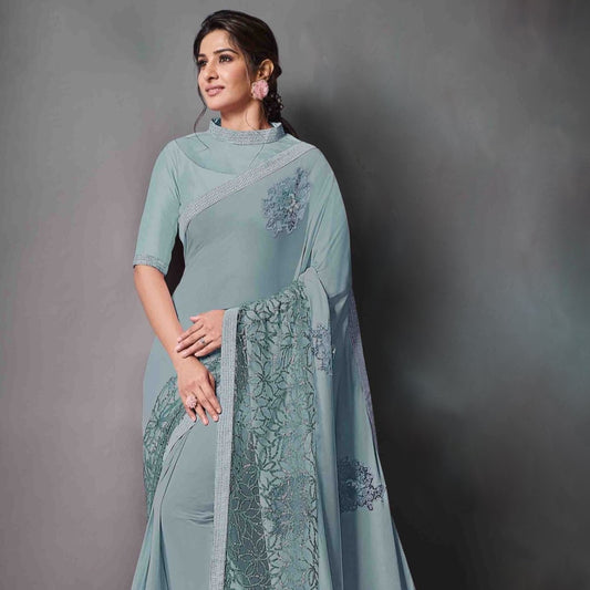 Teal Color Partywear Sequins Embroidered Net Saree