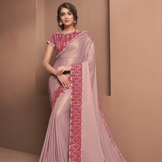 Light Pink Colored Satin Georgette Embroidered Saree With Stitched Blouse.